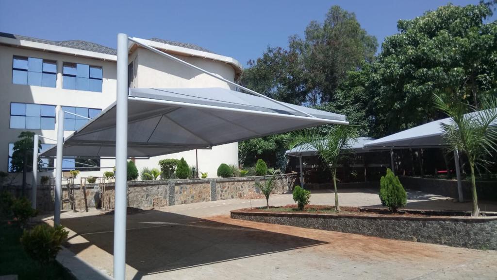 Car Shade-Carport-Cantilever Parking Shade-Shade Net Car Canopy for Commercial and Residential Use-Vehicle Parking Shades for Embassy-Office-Homes-Schools-Hospitals-Churches-Factories-Restaurants-Hotels-Resorts-Airports-Car Wash Shade-
