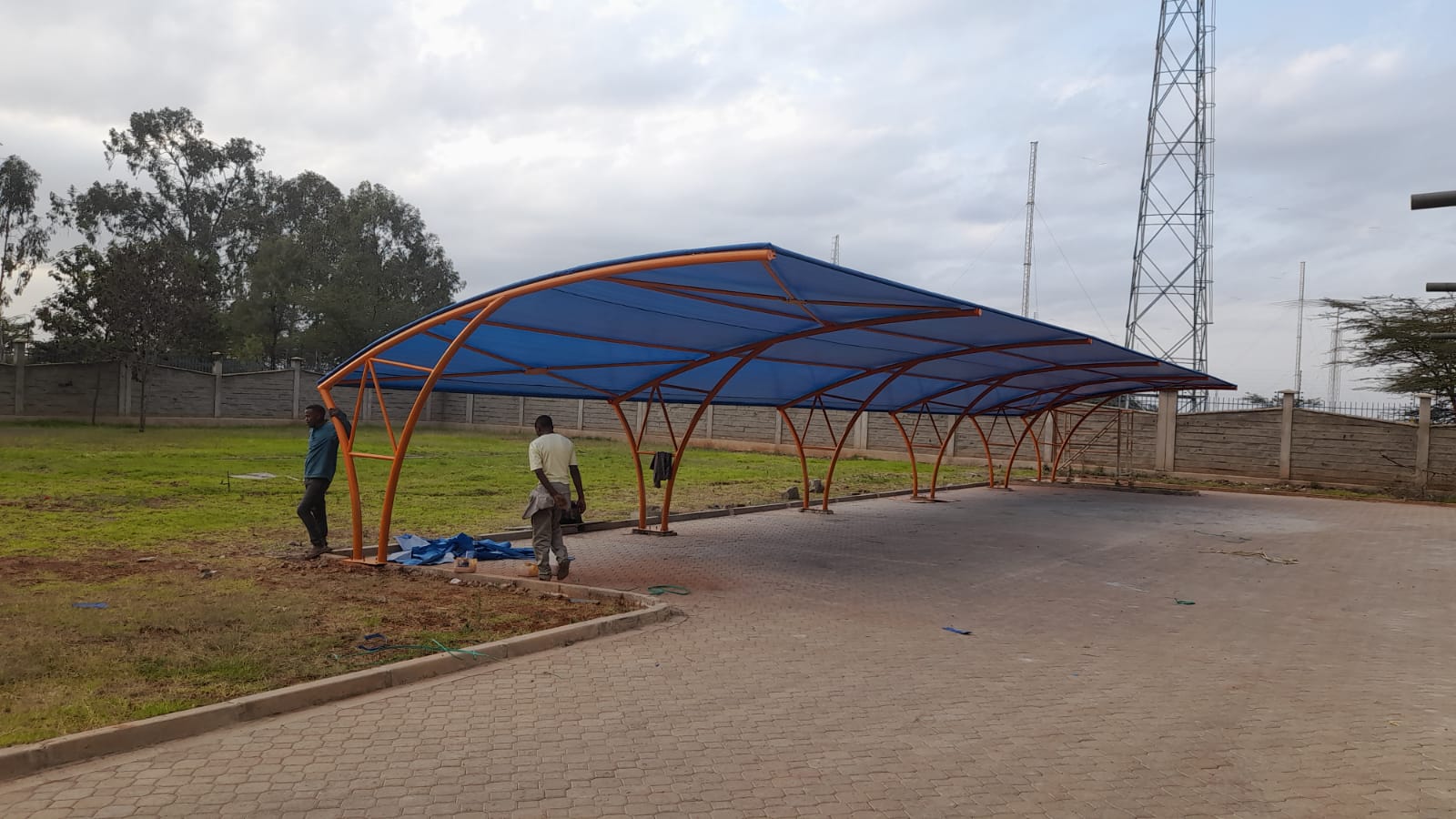 Car Port-Parking Shade for Commercial and Residential Areas-Cantilever Canopy-Curved Car Shade-Waterproof Shade-Sun shade-Vehicle parking cover-Garage Shade-Car Park Tent for Schools, Offices, Churches, Airports, Factories, Companies, University, Hospitals, Colleges, Government Institutions, Military and Arm Bases