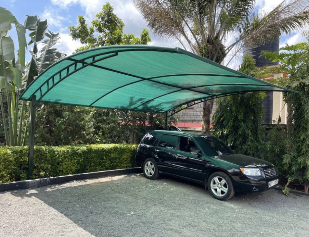 Modern Carport Installer in Mombasa-Curved Design Car Shade-Waterproof Green Shade Net Canopy-Vehicle Parking Shade-Luxury Outdoor Shade-Parking Tent-Garage