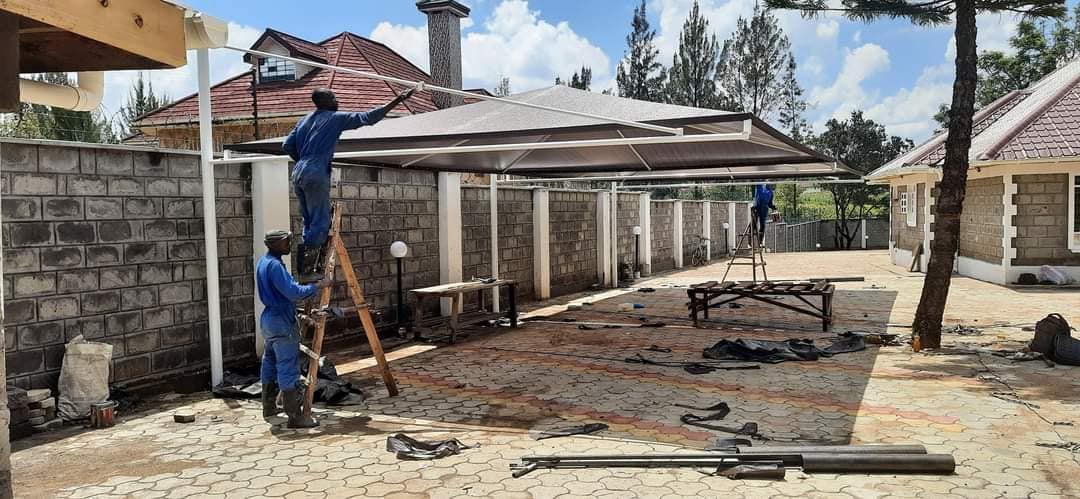Modern Carport Installers in Westlands, Brookside Drive, Lower Kabete Road, General Mathenge Road, Peponi Road, Spring Valley and Parklands Nairobi-Curved Design Car Shade-Waterproof Green Shade Net Canopy-Vehicle Parking Shade-Luxury Outdoor Shade-Parking Tent-Garage