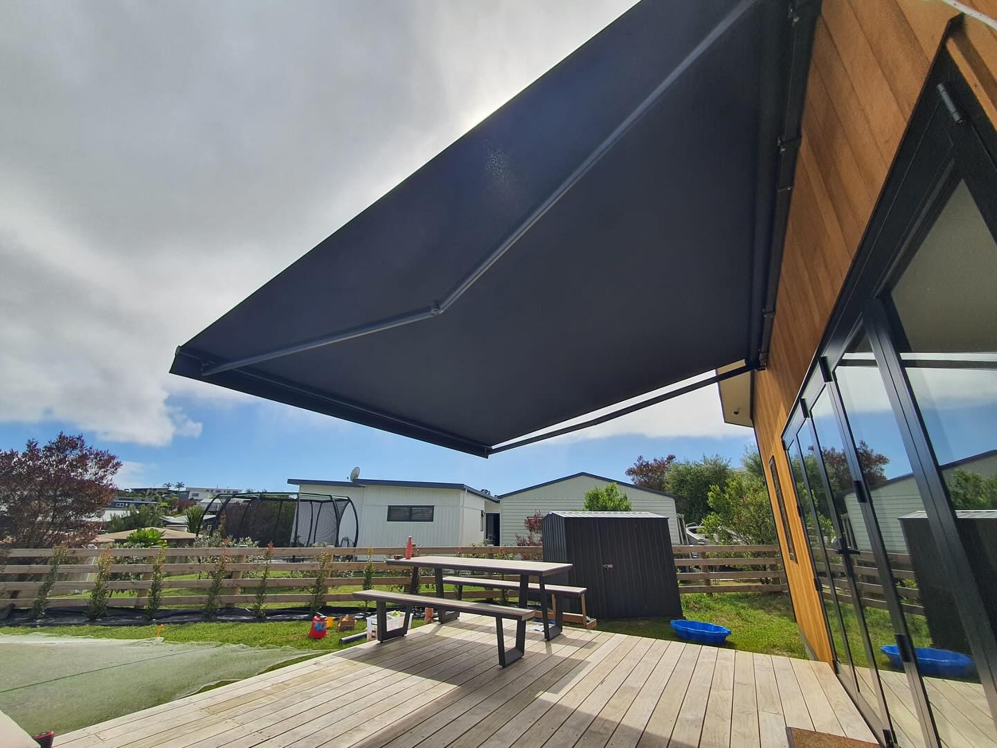RETRACTABLE AWNING 7 SBF INTERIORS AND OUTDOOR SOLUTIONS LTD