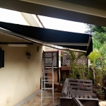 DARK GREY FOLDING ARM AWNING.1