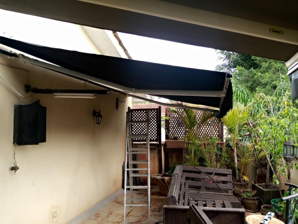 DARK GREY FOLDING ARM AWNING.1