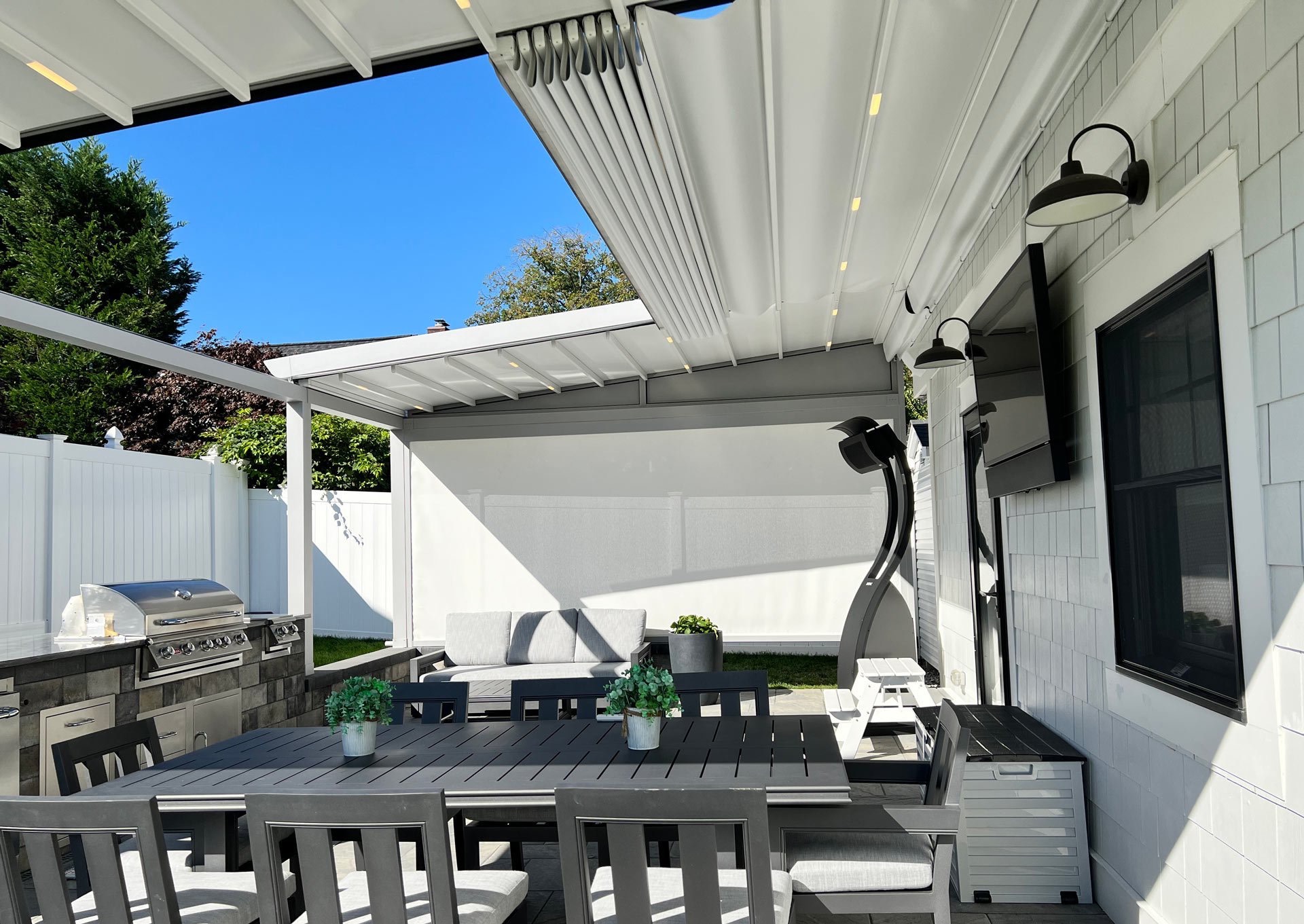 RETRACTABLE ROOF SYSTEM SBF INTERIORS AND OUTDOOR SOLUTIONS LIMITED. 1